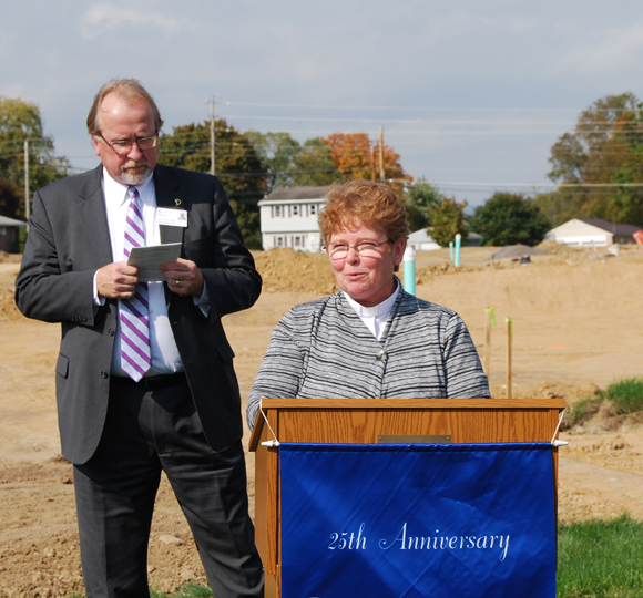 Bishop-Elect Barbara J. Collins prepares to bless the construction site.